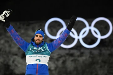 La joie du biathlète français Martin Fourcade après sa victoire à la mass start aux JO, le 18 février 2018 à Pyeongchang