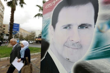 Un portrait du président syrien Bachar al-Assad à Damas, le 15 mars 2016