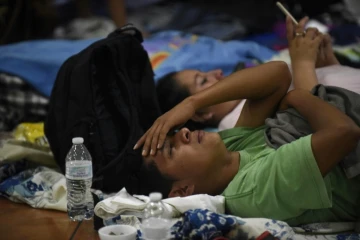 Des sinistrés du Volcan de Feu réfugiés dans une salle communale à Escuintla, au Guatemala