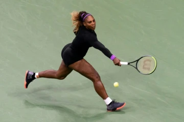 Serena Williams retourne la balle lors de son match des quarts de finale de l'US Open contre Qiang Wang, le 3 septembre 2019 à New York.