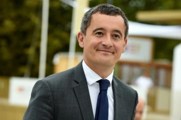 Le ministre des Comptes publics Gérald Darmanin arrive à l'université d'été du Medef, le 29 août 2019 dans l'ouest de Paris