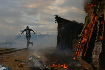 Heurts dans le bidonville de Kibera, à Nairobi, le 12 août 2017
