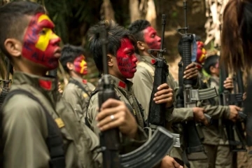 Des guerilleros maoïstes de la Nouvelle armée du peuple (NPA), dans les montagnes de la Sierra Madre, dans la jungle philippine, le 30 juillet 2017