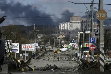Evacuation de civils de la ville d'Irpin, au nord de Kiev, le 10 mars 2022