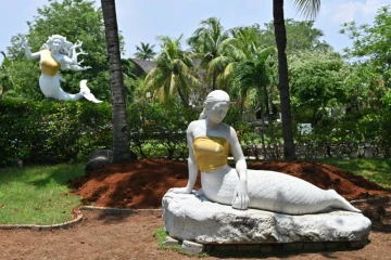 The bare chests of two mermaid statues have been covered up at an Indonesian theme park 