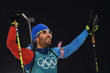 La joie du biathète français Martin Fourcade après sa victoire en mass stard 15 km aux JO, le 18 février 2018 à Pyeongchang