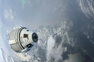 Illustration de la capsule Starliner en orbite autour de la Terre, fournie par Boeing en 2015