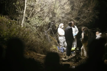 Des gendarmes sur une scène de crime après le meurtre d'un conseiller municipal en Corse, le 4 novembre 2017 à Soccia
