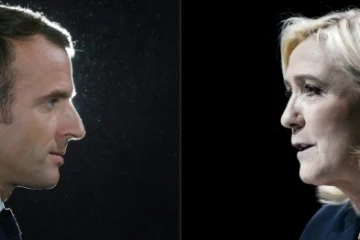 Le candidat-président Emmanuel Macron et la candidate du Rassemblement National Marine Le Pen dans un collage créé le 14 avril 2022