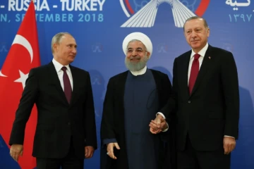 Photo fournie par la présidence turque montrant les présidents russe Vladimir Poutine, iranien Hassan Rohani et turc Recep Tayyip Erdogan au sommet tripartite à Téhéran, le 7 septembre 2018