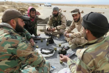 Soldats syriens le 29 mars 2016 près de Palmyre