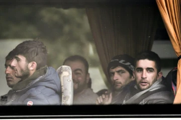 Des migrants évacués à bord d'un car jeudi 24 mai 2018 à Grande-Synthe