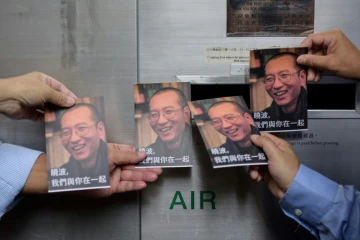 Des manifestants à Hong Kong avec des portraits du dissident chinois Liu Xiaobo, le 5 juillet 2017