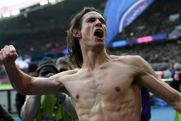 L'attaquant uruguayen du PSG laisse éclater sa joie après avoir marqué son 157e but sous les couleurs parisiennes à domicile face à Montpellier le 27 janvier 2018