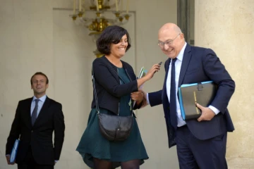 Emmanuel Marcron, Myriam El Khomri et Michel Sapin à l'issue du conseil des ministres le 23 septembre 2015 à l'Elysée à Paris