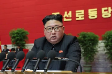 Image fournie par KCNA, agence officielle de Corée du Nord, du dirigeant nord-coréen Kim Jong Un lors du 8e congrès du parti au pouvoir, le 7 janvier 2021, à Pyongyang