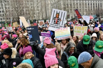 Des manifestants à la "Marche des femmes", le 19 janvier 2019 à New York
