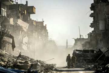 Des combattants des Forces démocratiques syriennes à Raqa, ancienne "capitale" du groupe Etat islamique en Syrie, le 21 octobre 2017