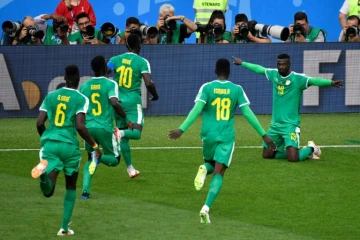 La joie des Sénégalais après le but de Mbaye Niang (d) face à la Pologne lors du Mondial, le 19 juin 2018 à Moscou