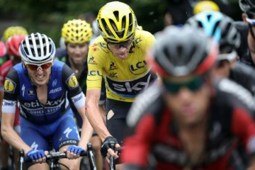 Le peloton avec le maillot jaune britannique Christopher Froome lors de la 19e étape du Tour de France Albertville-Saint-Gervais Mont Blanc, le 22 juillet 2016