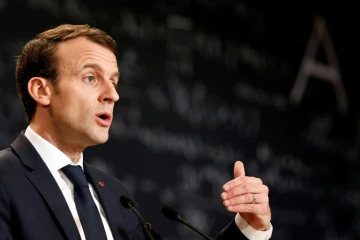 Emmanuel Macron prononce un discours lors d'un colloque sur l'intelligence artificielle au Collège de France à Paris le 29 mars 2018