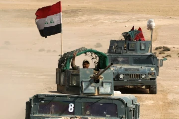 Des membres des forces irakiennes, le 27 octobre 2016 près d'un village au sud de Mossoul