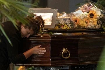 Cérémonie à Gênes avant l'enterrement des victimes de l'effondrement du pont, le 17 août 2018