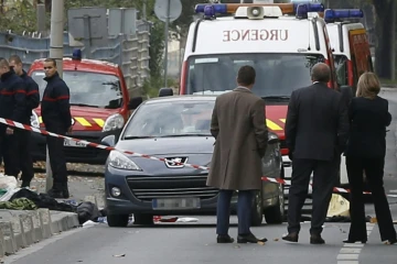 Des officiers de police à l'Ile-Saint-Denis le 5 octobre 2015 après un braquage