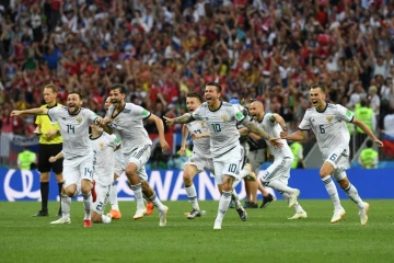 Les Russes explosent de joie après avoir éliminé l'Espagne aux tirs au but, le 1er juillet 2018 au stade Loujniki à Moscou
