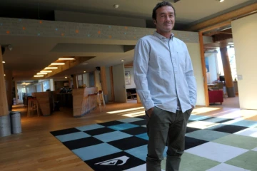 Pierre Agnès, 54 ans, président du groupe Boardriders Inc, possédant les marques Quicksilver, Roxy et DC Shoes dans son bureau à Saint-Jean de Luz, le 17 octobre 2014 
