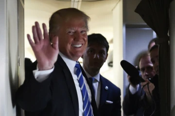Le président américain Donald Trump, le 5 avril 2018 à bord de l'avion présidentiel Air Froce One à Washington