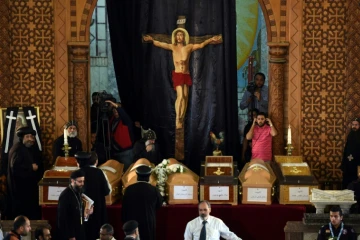 Cercueils de victimes de l'attentat contre une église copte d'Alexandrie lors d'une procession funéraire à Borg El-Arab le 10 avril 2017