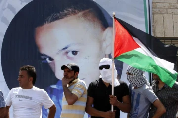 Portrait de Mohammed Abou Khdeir, lors de ses funérailles à Jérusalem-Est, le 4 juillet 2014