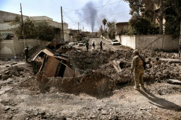 Les forces irakiennes dans un quartier repris au groupe EI le 7 mars 2017 à Mossoul