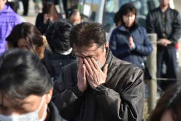 Une minute de silence observée par les Japonais le 11 mars 2017 à Natori  