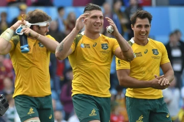 Ben McCalman de l'équipe d'Australie(à gauche), Sean McMahon et Nick Phipps (à droite) après la victoire contre l'Uruguay lors de la coupe du monde de rugby le 26 septembre 2015 à Birmingham