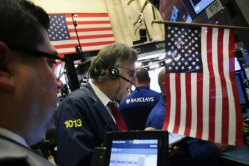 Des traders à la Bourse de New York , le 8 décembre 2015.