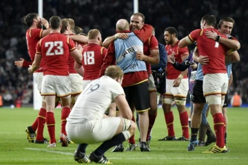 Les joueurs gallois explosent de joie à l'issue de la victoire sur l'Angleterre en Coupe du monde de rugby, le 26 septembre 2015 à Twickenham