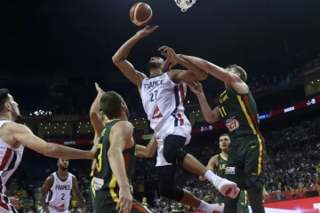 Le Français Rudy Gobert (c) lors de la qualification des Bleus pour les quarts de finale de la Coupe du monde après leur victoire 78-75 sur la Lituanie à Nankin le 7 septembre 2019