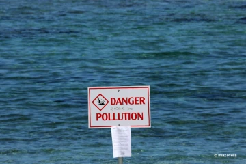 Panneau pollution plage