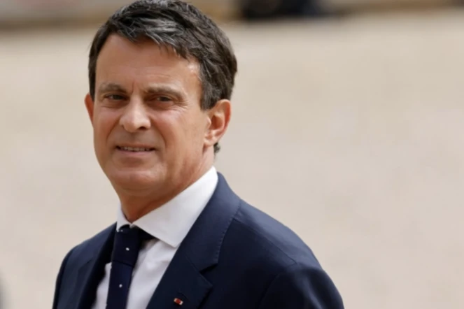 L'ancien Premier ministre Manuel Valls arrive à l'Elysée, le 7 mai 2022 à Paris ( AFP / Ludovic MARIN )