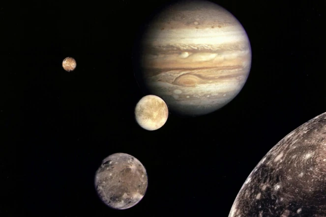Image fournie en 2003 par la Nasa montrant les quatre lunes galiléennes de Jupiter: Io, Europe, Ganymède et Callisto 