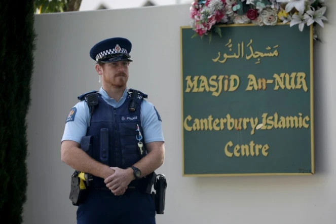 A police officer stands guard outside the Al Noor mosque ahead of the first anniversary of the Christchurch mosque shootings in Christchurch in March 2020
