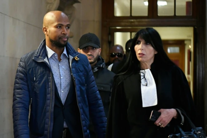 Le rappeur Rohff avec son avocate Malika Ibazatene au tribunal à Paris le 29 septembre 2019
