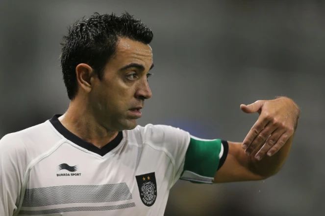 La légende du FC Barcelone et de l'équipe d'Espagne Xavi Hernandez, alors sous les couleurs du club qatari de Al-Sadd, lors d'un match du championnat local, le 27 novembre 2015    