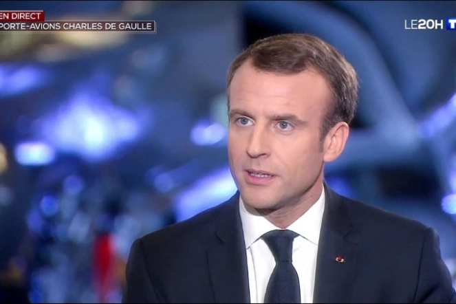 Photo de l'interview d'Emmanuel Macron à bord du Charles de Gaulle diffusée par TF1, le 14 novembre 2018 au large de Toulon