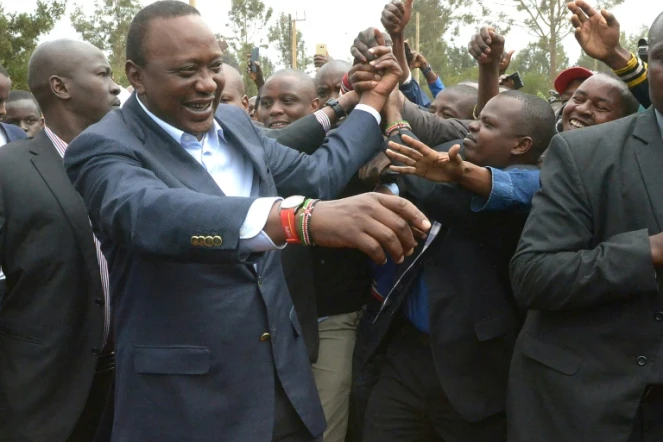 Le président kényan Uhuru Kenyatta à la sortie d'un bureau de vote à Gatundu le 8 août 2017