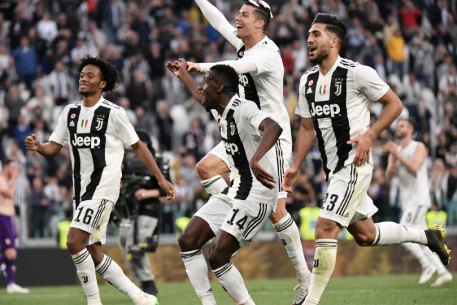 Les joueurs de la Juventus en liesse après avoir conquis le 8e titre d'affilée de champion d'Italie en battant la Fiorentina, le 20 avril 2019 à Turin