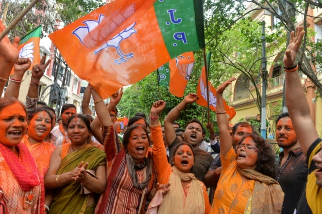 Des partisans du BJP, le parti du Premier ministre indien Narendra Modi, fêtent le résultat des élections législatives, le 23 mai 2019 à New Delhi