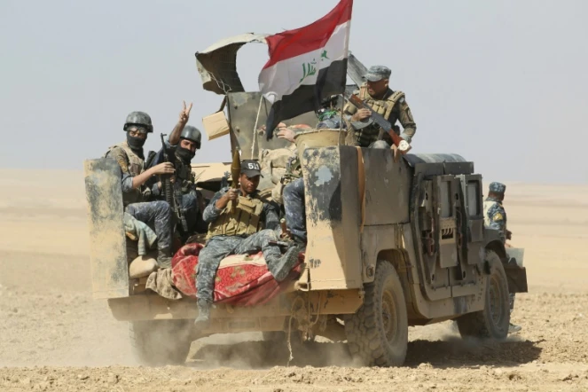 Des forces gouvernementales irakiennes se déploient le 18 octobre 2016 Bajwaniyah à 30 km de Mossoul